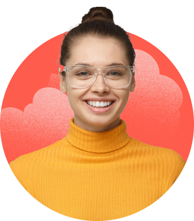 A headshot of a woman who’s smiling, has clear glasses, and is wearing an orange shirt.